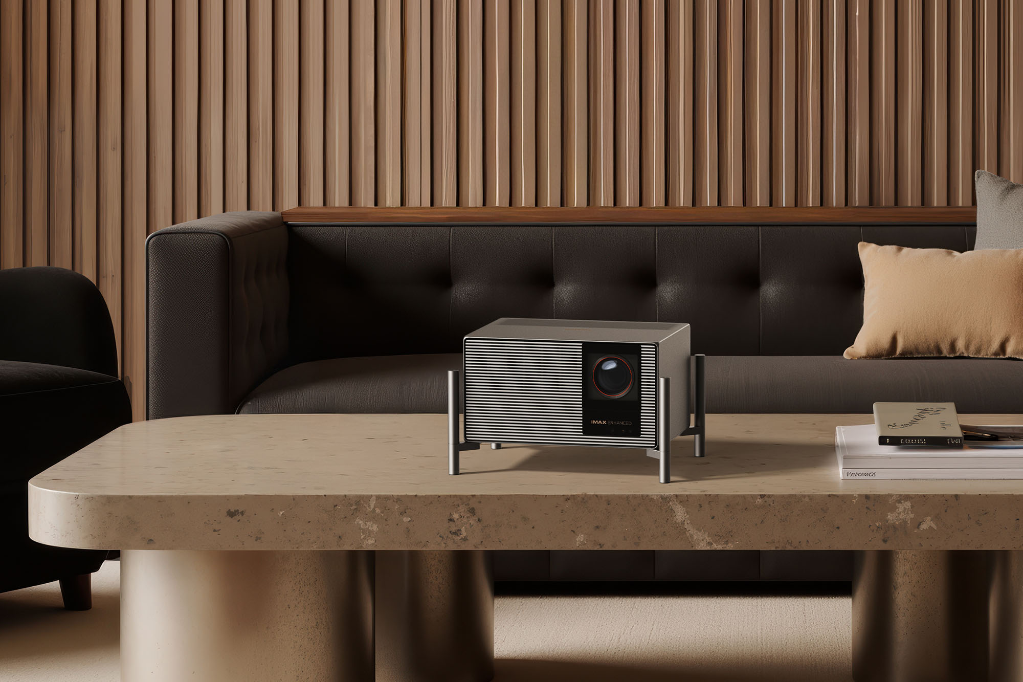 Shiny XGIMI Titan Noir MAX lifestyle projector sitting on a table in a modern apartment full of neutral colors