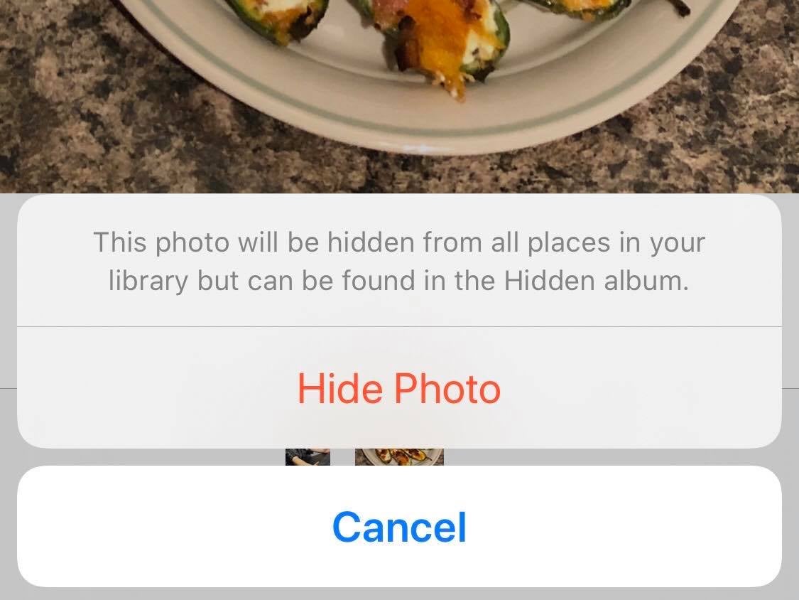 An iOS option to hide a photo of jalapeño poppers from being visible to anyone viewing your camera roll.