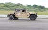 Reconfigurable humvee wheel track by Darpa and Carnegie Mellon on a vehicle on the road