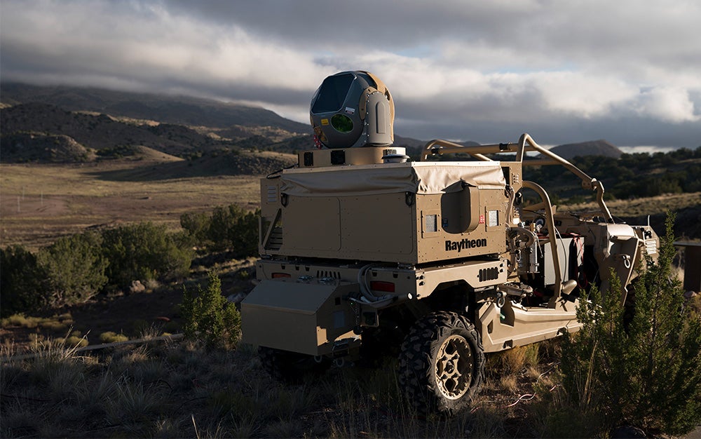 High Energy Laser Shooting Weapon System by Raytheon on an ATV