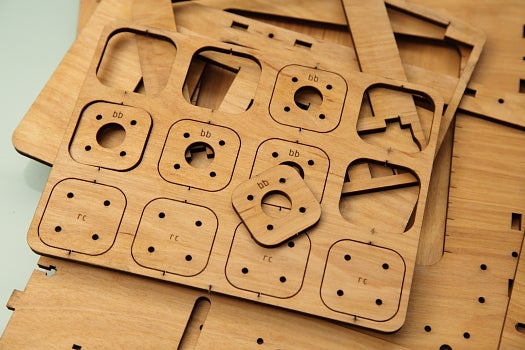 Most of the structural elements come in boards of laser-cut parts--just pop them out and build away.
