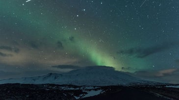 Meteor shower and Northern Lights over Snæfellsnes glacier, Iceland