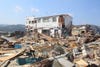 Tsunami house destruction extreme weather