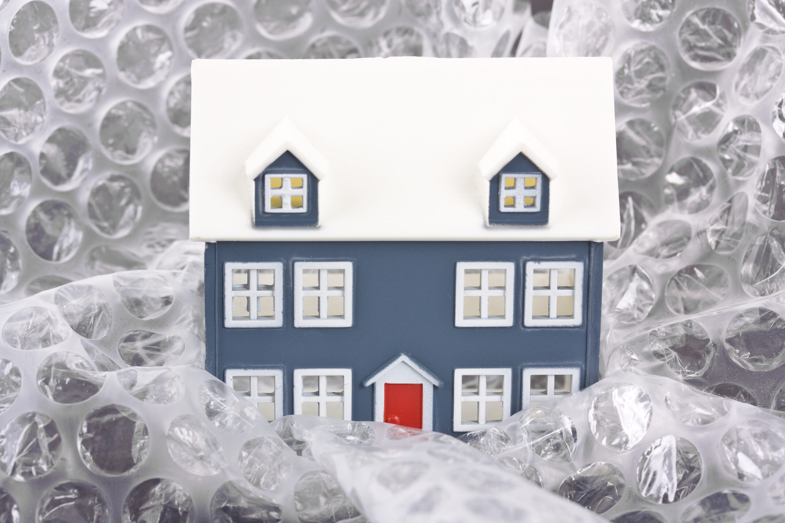 a tiny house wrapped in bubble wrap