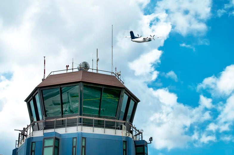 Air traffic control tower plane takeoff