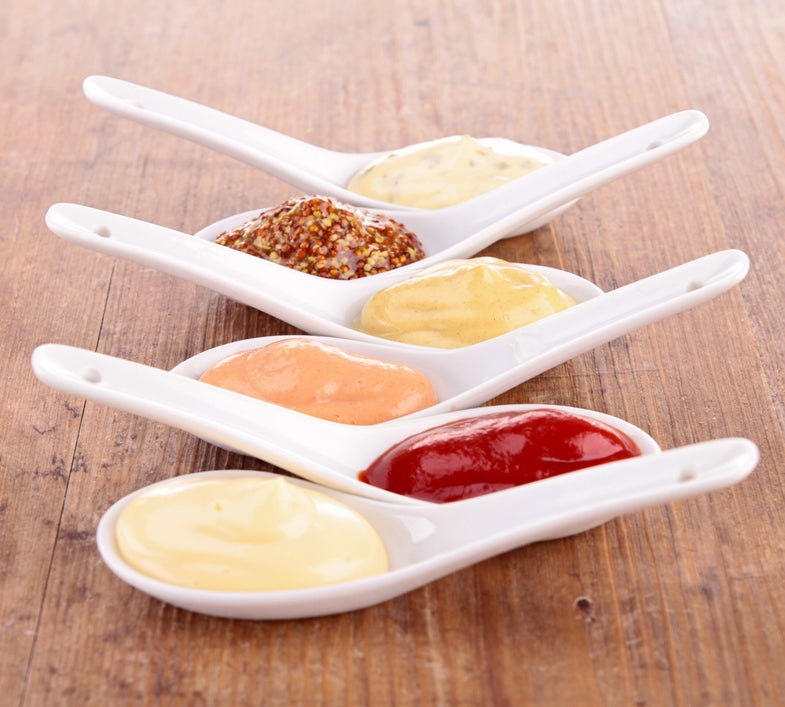 spoons full of condiments