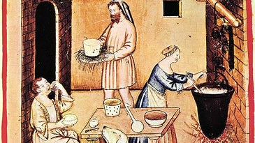 a medieval illustration of people cooking 