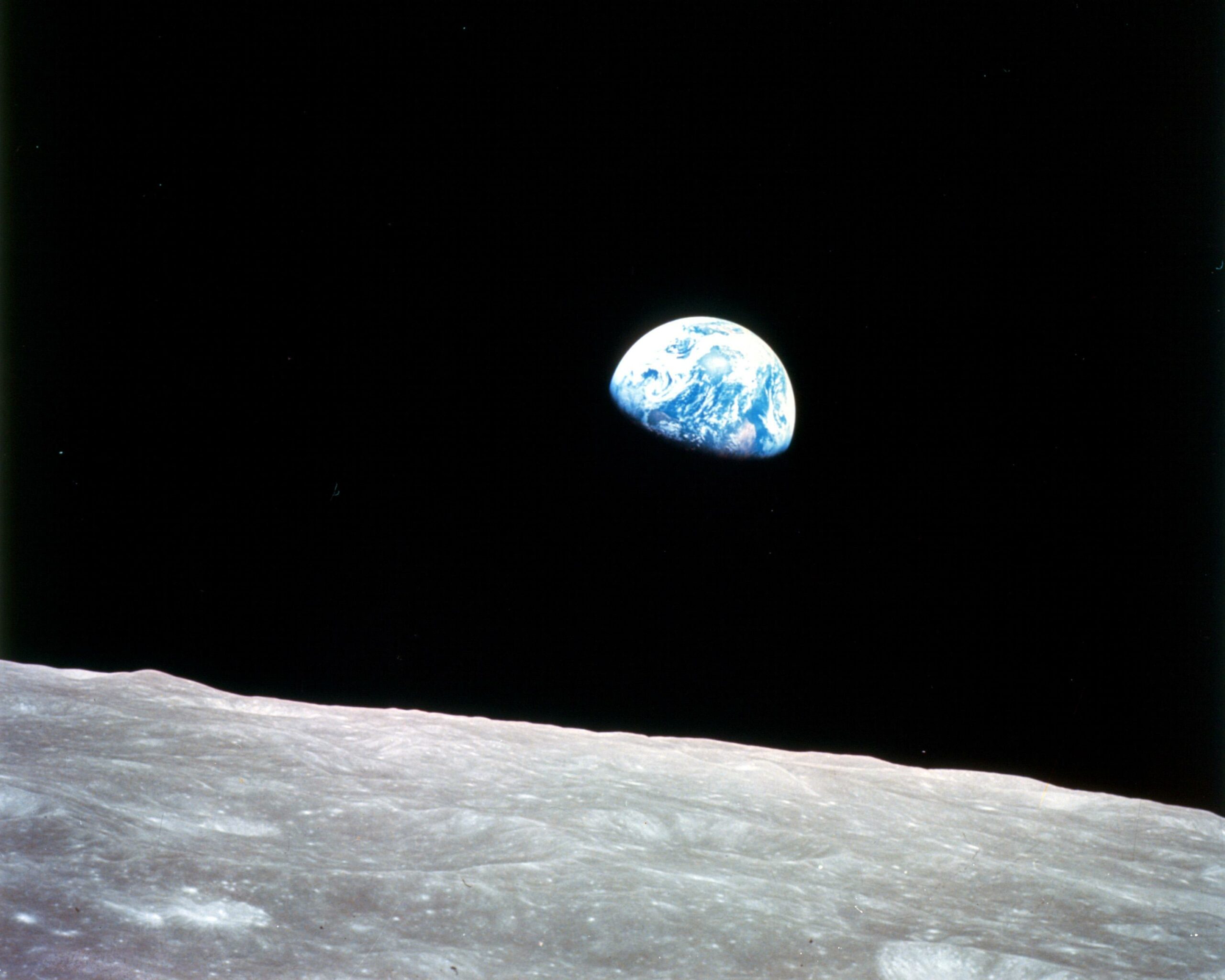 the earth rising over the moon