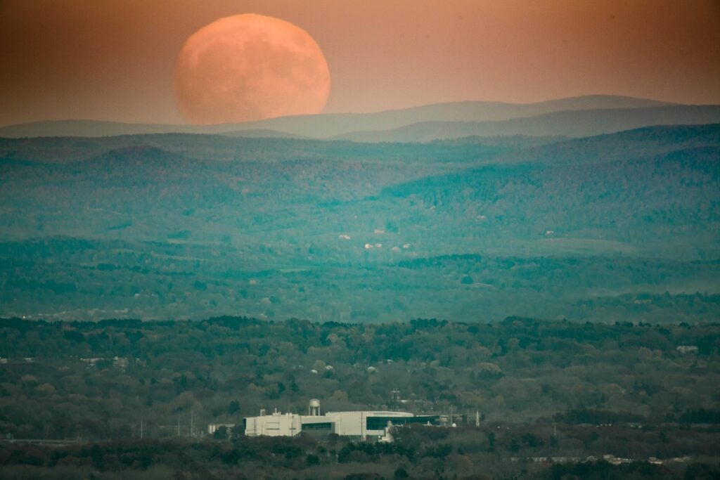 Super Moon rise over a valley