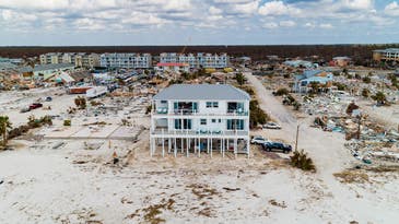 Hurricanes destroy beachside homes, but not this one