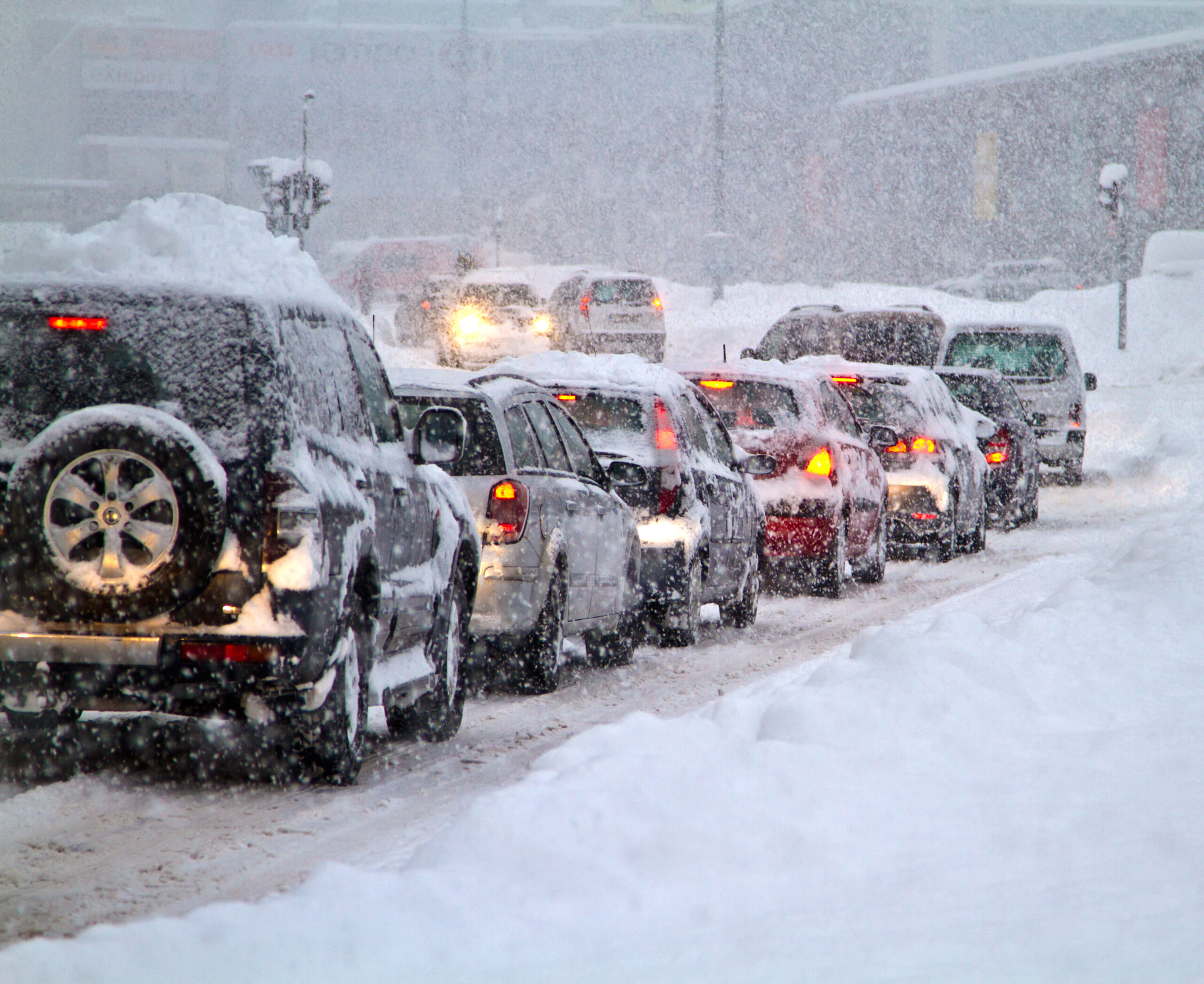 Cars in a blizzard caused by a bomb cyclone
