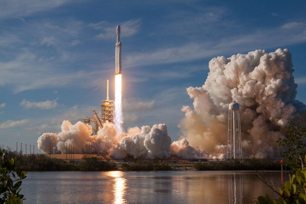 falcon heavy taking off from launchpad