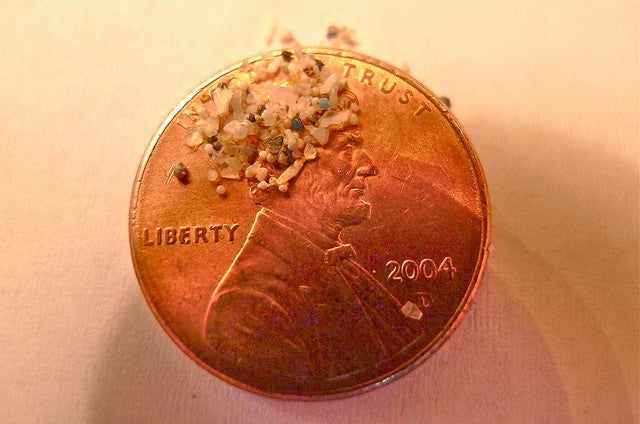 Traditional microbeads are bits of plastic so small that it would take hundreds of them to cover a penny.