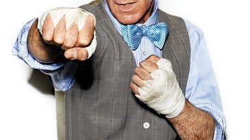 Bill Nye throwing a punch