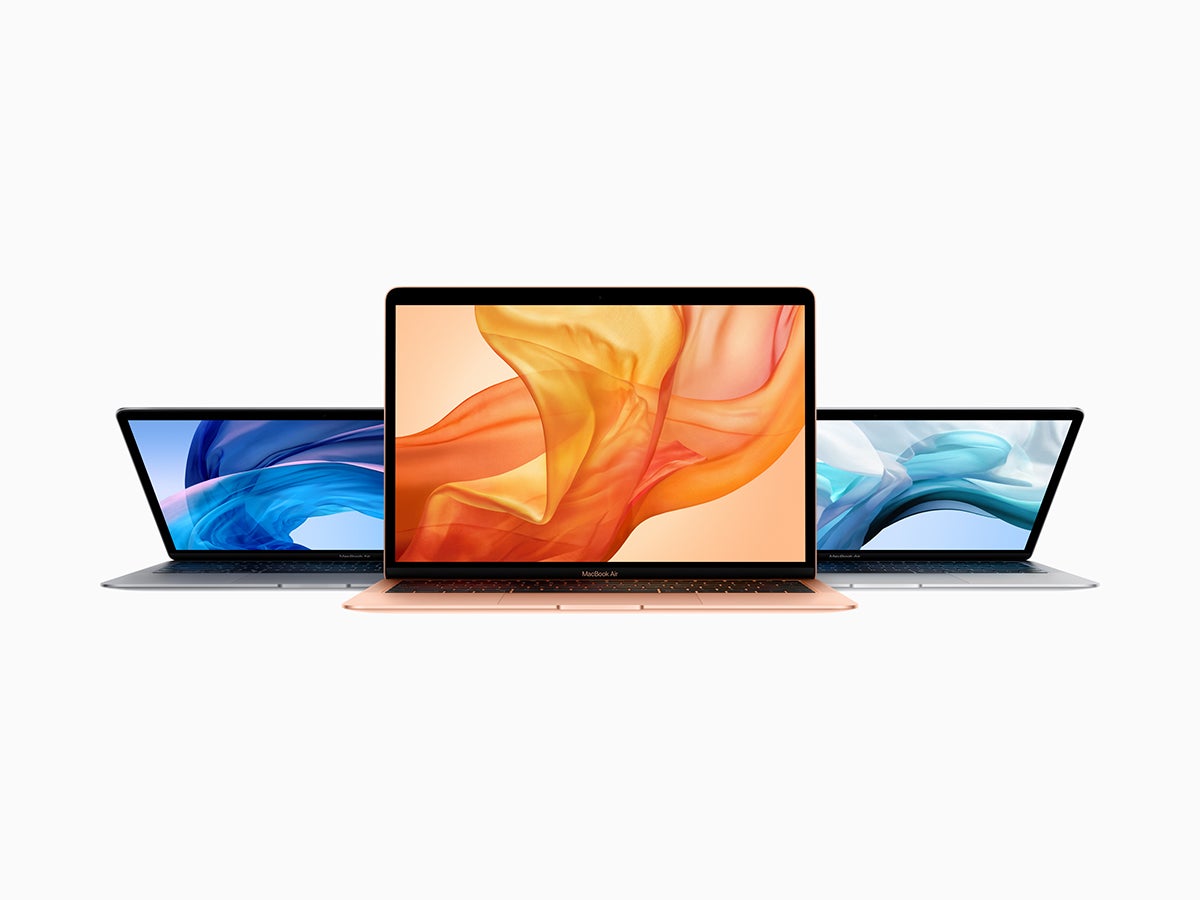 Three Macbook Air laptops against a white background.