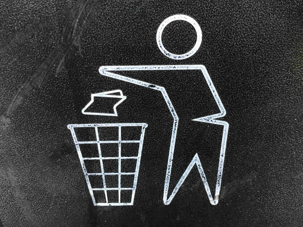 Close up of a recycle garbage bin logo at Pershing Square in Los Angeles, CA