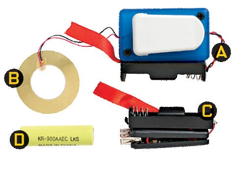 Clockwise starting in top left: a piezoelectric device, an AA battery charger, a converter, and an AA battery.