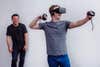 Mark Zuckerberg wears an Oculus Rift virtual reality headset