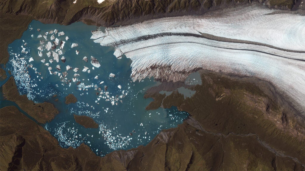 This is Bear Glacier Lake, connected to the largest of the 38 glaciers found in Kenai Fjords National Park in Alaska. This image (and others) was critical in determining an August 2008 glacier outburst flood, according to the <a href="http://www.nps.gov/kefj/parknews/bear-glacier-outburst-flood.htm">National Park Service</a>. On August 19, 2008 a local sea kayak guiding company reported unusually high water levels, and park staff noticed a small glacier-dammed lake had recently drained. This small unnamed lake was about 8 miles up-glacier and northwest of Bear Glacier Lake. In this satellite imagery, it previously occupied an area of about 0.17 square miles. Estimates of water release exceeded 7,500 acre-feet, according to the NPS. An acre foot is the amount of water it would take to cover an acre of land one foot deep.