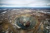 This humongous crater is actually a retired diamond mine in Siberia. The 525-meter-deep and 1.2-kilometer-wide pit is the second-largest excavated hole in the world.