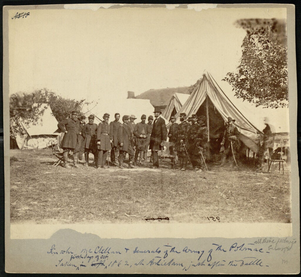 Taken October 3, 1862, this picture shows President Lincoln meeting with General George B. McClellan. Sharpsburg was the site of the battle better known as Antietam, where about 80,000 Union forces successfully defeated an army of about 40,000 Confederate forces. The battle halted Confederate General Robert E. Lee's invasion of Maryland, though the ever-cautious McClellan failed to pursue Lee's army. The battle was a Union victory, but an incomplete one. Eager to see McClellan continue the attack against his retreating foe, Lincoln met with the general to urge him forward. Frustrated by either McClellan's inability or refusal to do so, Lincoln would remove him from command just a month after this photograph was taken.