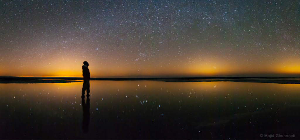 Stars sparkle over Maranjab Salt Lake in Iran as cities send up golden domes of light from below. Can you see the constellation Orion in the middle of the photo? "The reflected starlight from the water is polarized. That's why the reflected image is more clear than sky," photographer Ghohroodi told judges.