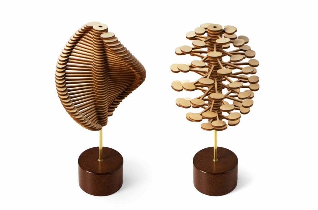 A still image won't do justice to the Helicone: Its magic is in movement. Utilizing the Golden Ratio, the wooden toy spirals from a helix to a pinecone-looking shape with a quick twist of its base. Mesmerizing math? Thumbs up. <strong>$35, available June</strong>