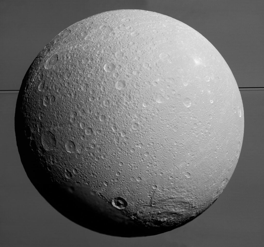 Another photo of Saturn's moon Dione from NASA's Cassini spacecraft, which shows the entirety of the celestial body. The picture was taken ranging from 106,000 to 36,000 miles away, and each pixel represents 1,500 feet on the surface.