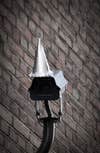 For George Orwell&#8217;s Birthday, Artists Top Surveillance Cams With Party Hats