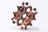 Robert Wechsler makes these chemical-bond-like sculptures out of loose change. So if he sells them for, like, a dollar, it's a net gain.