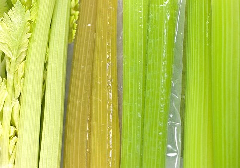 Eight stalks of celery, raw and cooked in different ways.