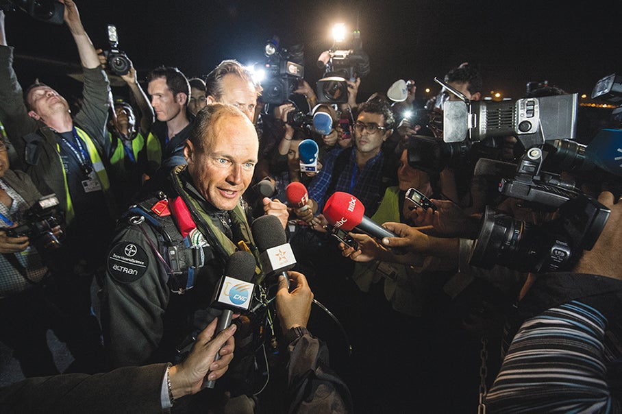 Pilot Bertrand Piccard in 2012, after flying a solar plane across the Med­i­ter­ranean.