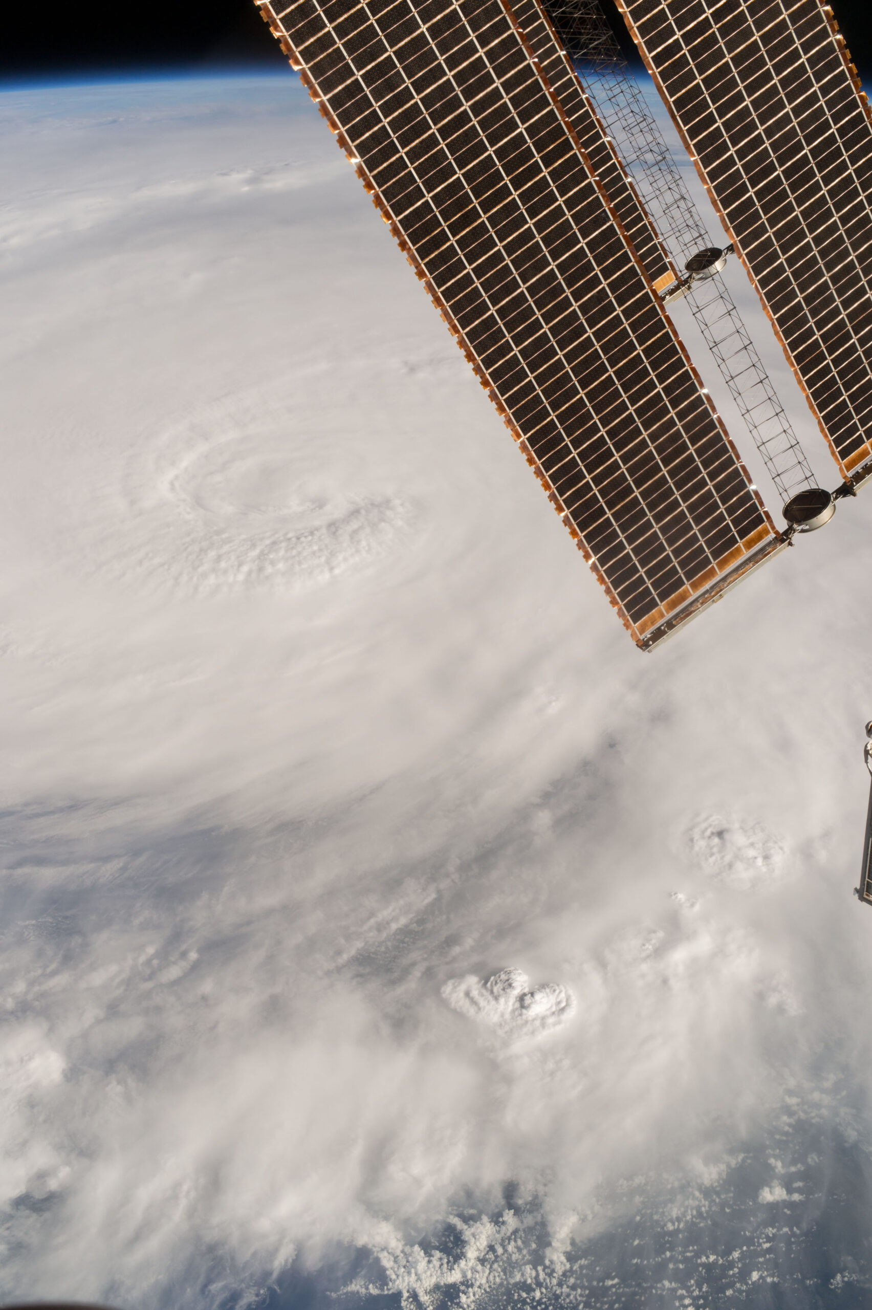 A Field Of Volcanoes And A Hurricane Seen From Space