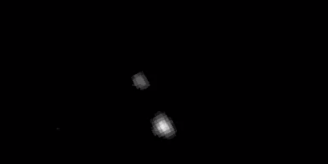 New Horizons Spacecraft, En Route To Pluto, Sends Back First Images Of The Dwarf Planet