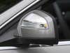 The C300's sideview mirrors fold back automatically when you lock the car.