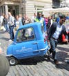 The minuscule Peel P50, which was featured in a <a href="http://www.google.com/url?sa=t&amp;rct=j&amp;q=&amp;esrc=s&amp;source=web&amp;cd=1&amp;ved=0CFUQtwIwAA&amp;url=http%3A%2F%2Fwww.youtube.com%2Fwatch%3Fv%3DdJfSS0ZXYdo&amp;ei=7H62T72UFYGu8ATb2oipCg&amp;usg=AFQjCNFTvq-UHqdkQEJ5nTdGyRVhPmOR6Q">famous episode of <em>Top Gear</em></a>, has come back to life after nearly 50 years with two new models, including this P50. The P50 weighs 240 pounds, has a 3.35-horsepower motor, and can manage a top speed of 28 mph. You can also tow it around with one hand. Read more <a href="http://jalopnik.com/5910190/the-worlds-smallest-cars-are-back-on-sale-for-insane-money">here</a>.