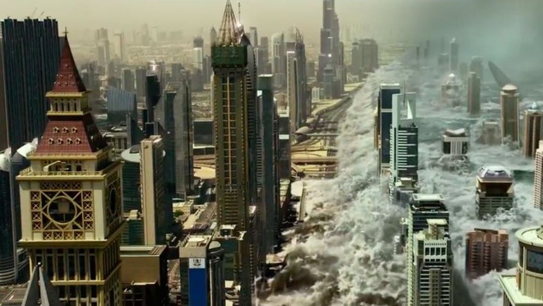a wave crashes into a city