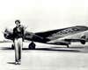 earhart in front of plane
