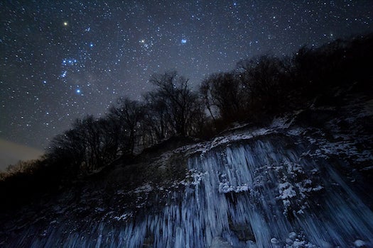 This photo, which won in the "Earth and Space" category, should be getting extra points for making terra firma seem like space, too. The judges particularly liked the lines in the ice leading you skyward to Orion, Taurus, and the Pleiades.