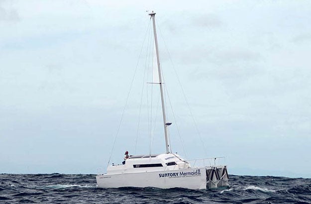 Captain Ken-ichi Horie, aboard the <em>Suntory Mermaid II</em>, prepares to travel solo 4,350 miles from Hawaii to Japan on wave power alone.