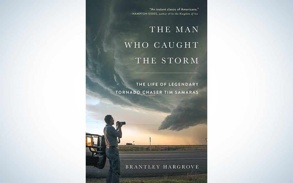 book jacket featuring a man photographing a storm outside his car
