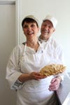 Bonnie and Wayne King show off a freshly baked pastie.
