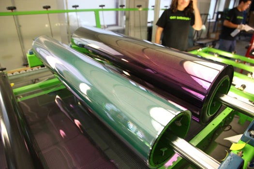 Each window also gets coated with a thin Mylar film that and is then baked in an oven that stretches the UV-retarding material tightly against the glass, removing any visible imperfections. The film goes on with a purple hue but after the heat treatment appears clear.