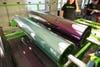 Each window also gets coated with a thin Mylar film that and is then baked in an oven that stretches the UV-retarding material tightly against the glass, removing any visible imperfections. The film goes on with a purple hue but after the heat treatment appears clear.
