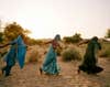 Three women pulling water from a well in the Thar desert