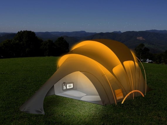 glowing solar tent in nature at nighttime