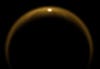 Cassini's infrared vision allowed it to peer through the clouds and catch the sunlight sparkling on one of Titan's lakes.