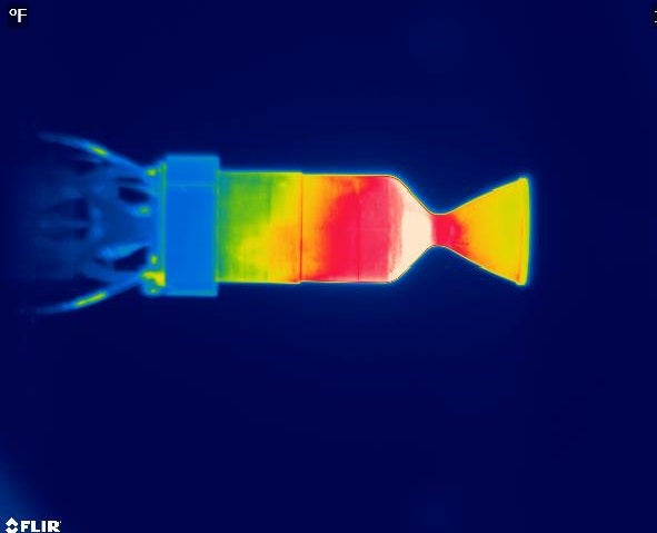 An infrared image of a 22 Newton thruster taken during a 10-second pulsing test using the LMP-103S green propellant.