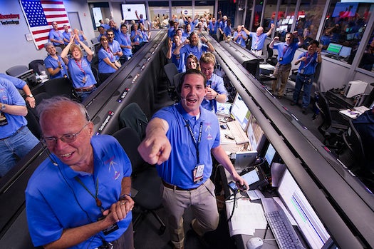 The Mars Science Laboratory (MSL) team celebrates in the MSL Mission Support Area.