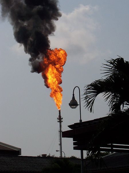 At oil wells, drilling rigs, and refineries, tall stacks with shooting flames dot the landscape. These gas flares serve a safety function, burning up excess natural gas from relief valves to prevent over-pressurization. Oil companies also use fire as a way to dispose of gas that's too difficult to transport and sell. (This latter practice upsets environmentalists, who say it's a waste of a valuable natural resource and contributes to global warming.)